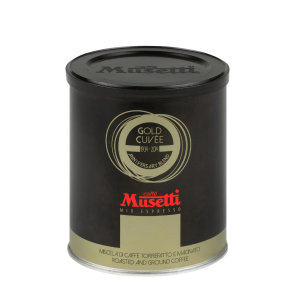 Черна и златна кутия печено и смляно кафе Musetti® Gold Cuvée, отбелязано като юбилеен бленд, идеално за следващия ви Outin.